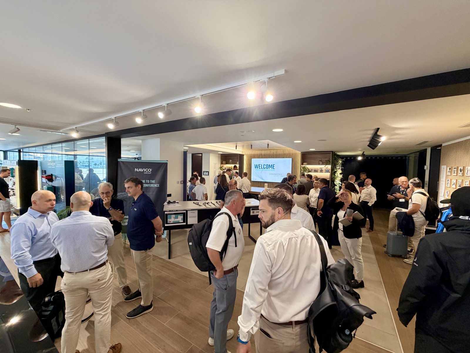 Participants networking at the Experience Center