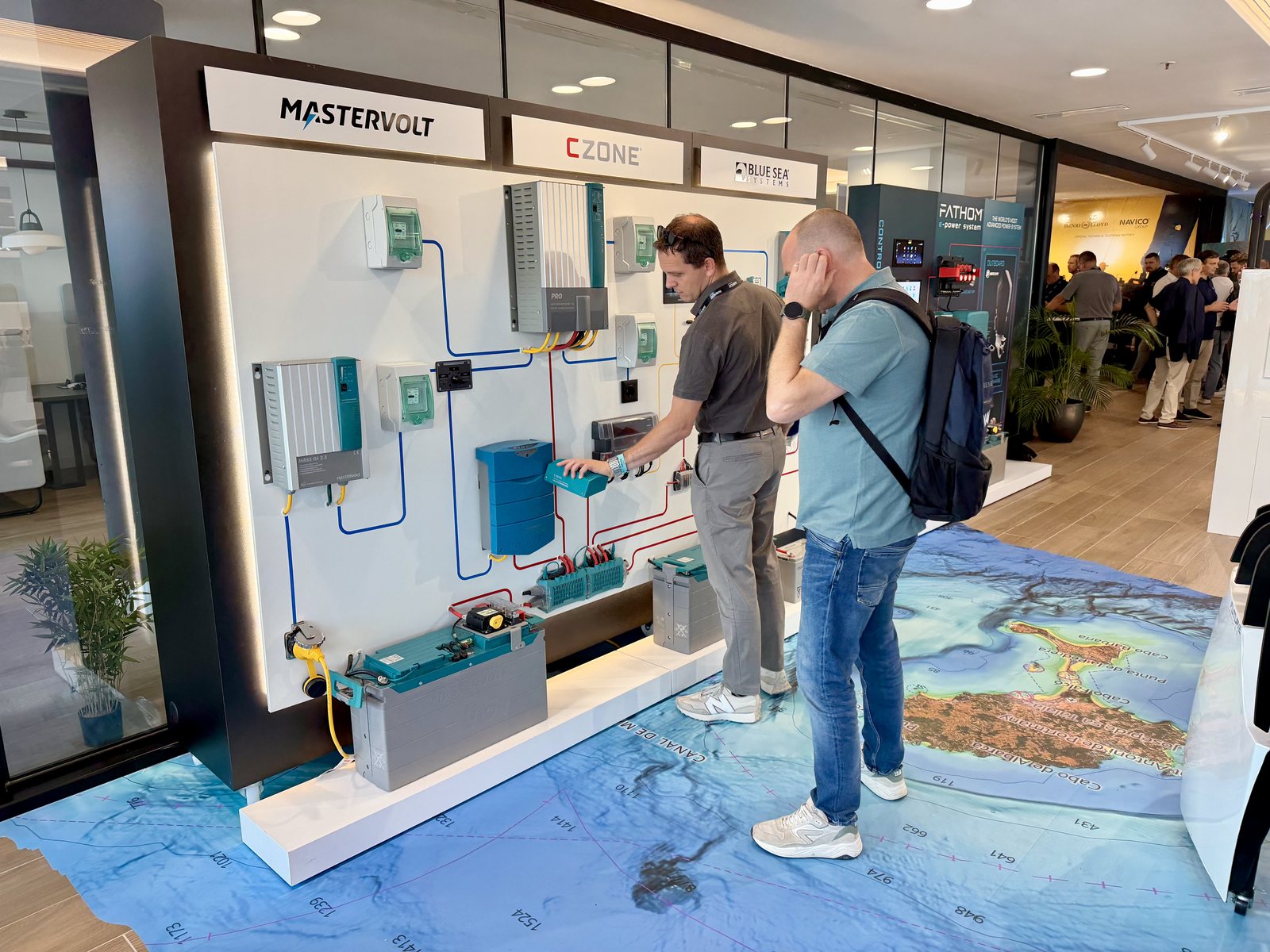 Participants at the Mastervolt, CZone and Blue Sea Systems demo wall
